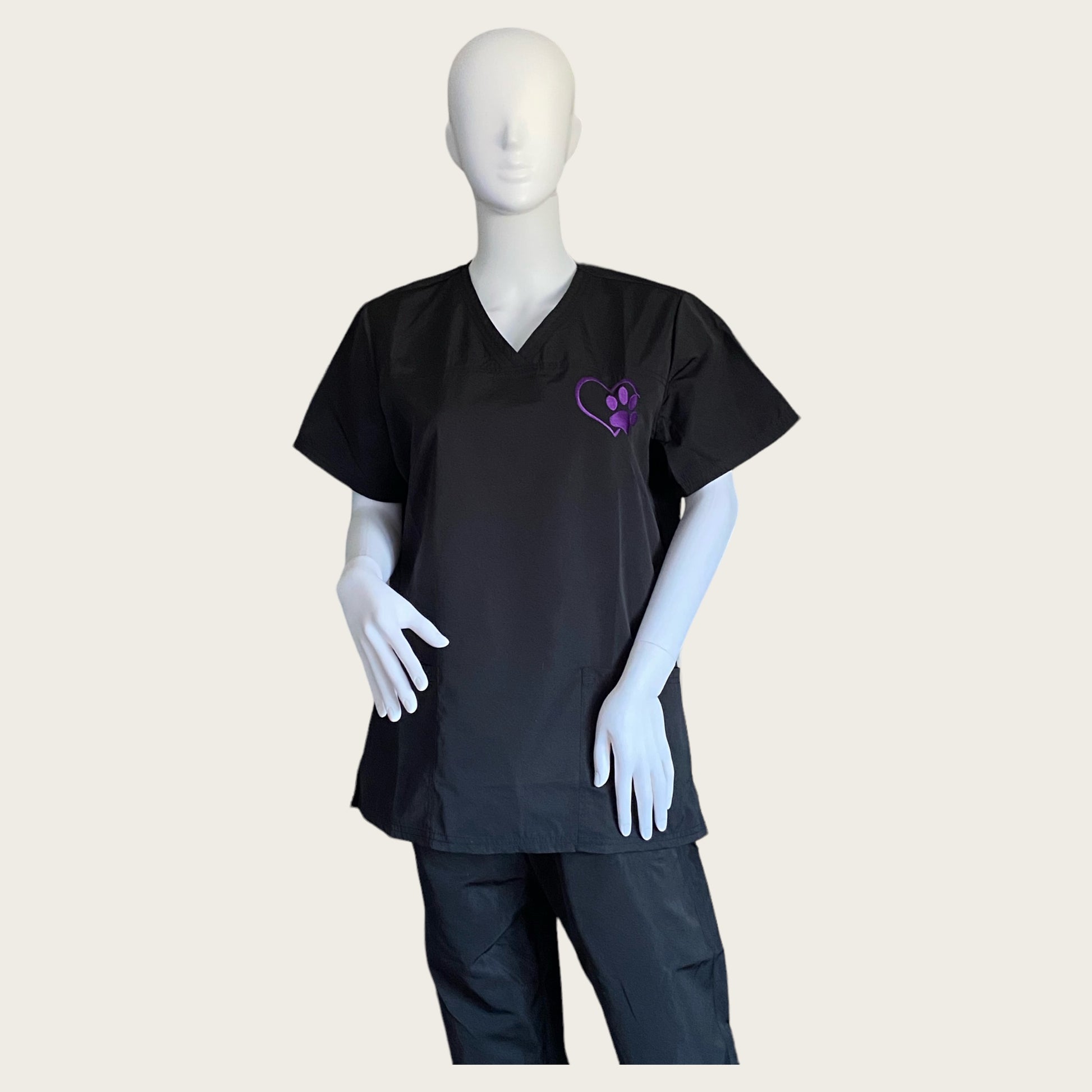 Embroidered V Neck hair resistant tunic in black with purple embroidered paw print logo GroomtecApparel