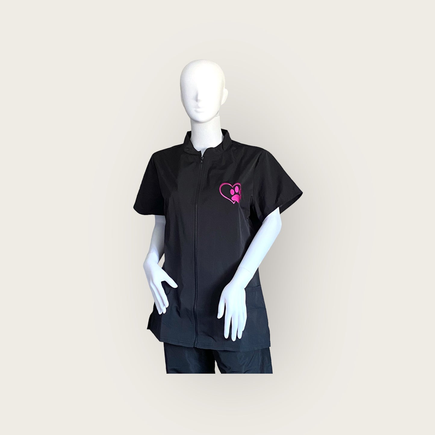 Embroidered Zip Up Hair resistant Grooming Tunic in black with pink embroidered paw print logo GroomtecApparel